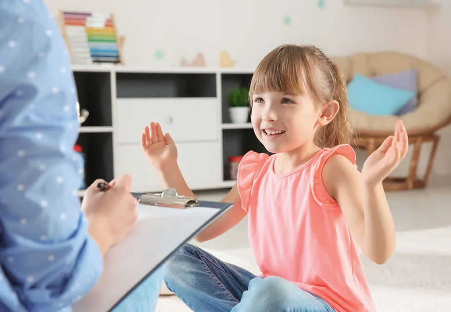 Child in early intervention therapy, a strategy to prevent autistic meltdowns.