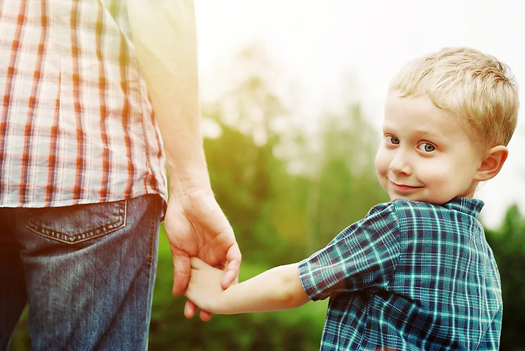 Happy autistic child receiving early intervention therapies.