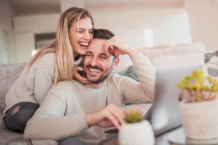 Parents enjoying an exciting karaoke date night at home