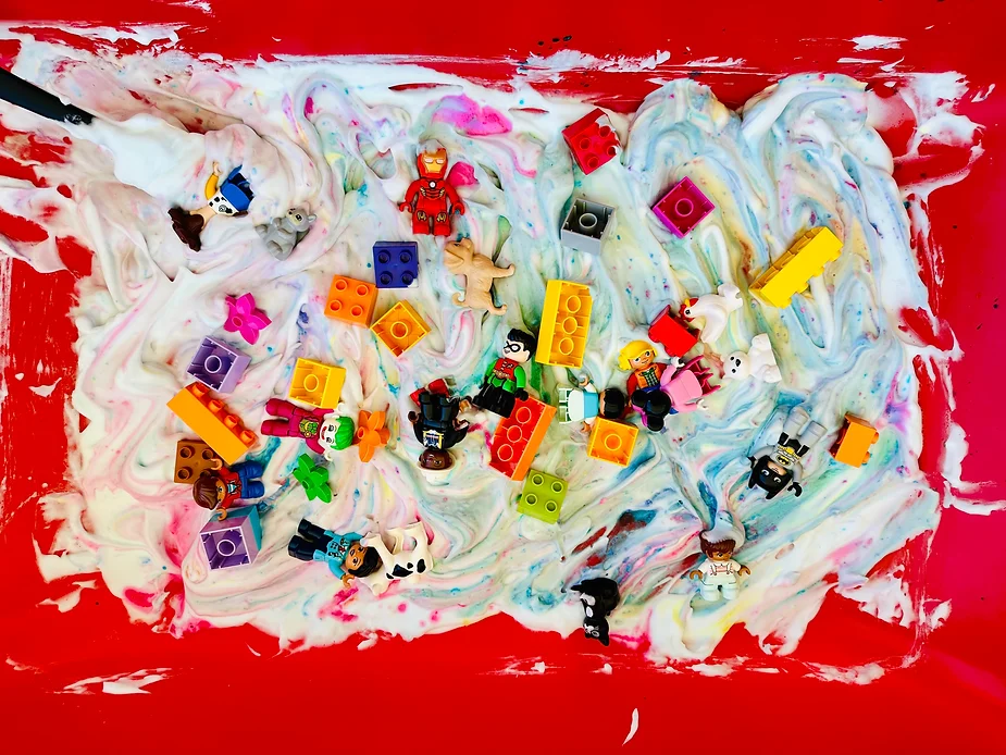 LEGOs added to the Shaving Cream and LEGO Sensory Bin